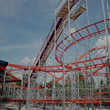 Roller coaster in Central Park during the day